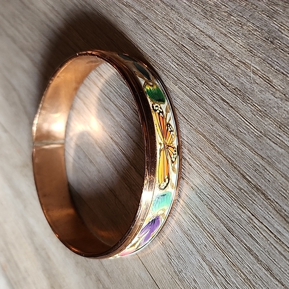 Butterfly and flower bangle bracelet